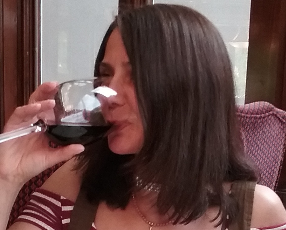 Mrs. Raines relaxes with glass of wine comedy music puzzles games