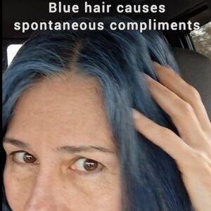 woman with blue hair reacts to husband's spontaneous compliments